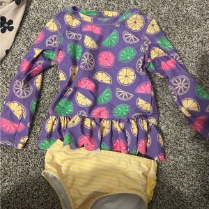 Ruffle Butts Purple Citrus Print Rashguard Set with Yellow Stripes